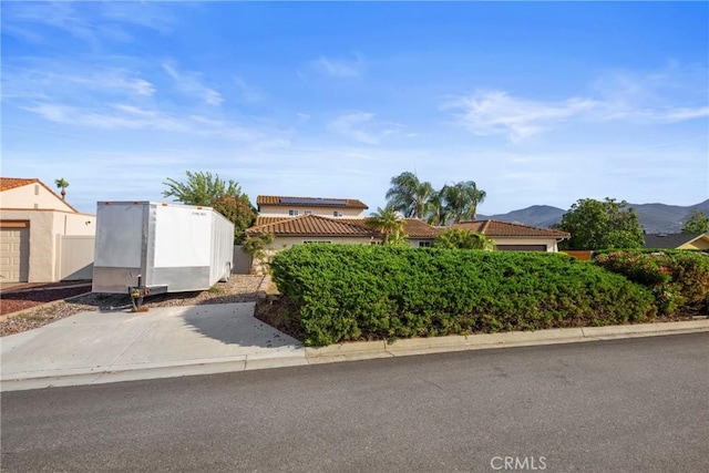 8609 Dunwoodie Rd, Santee, CA 92071 - view of front of house featuring a tile roof and a mountain view