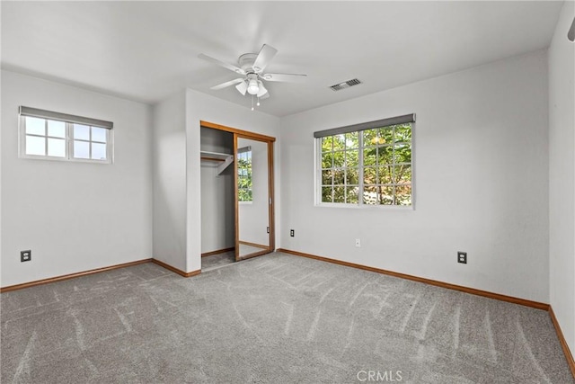 8609 Dunwoodie Rd, Santee, CA 92071 - unfurnished bedroom featuring multiple windows, carpet, and a closet