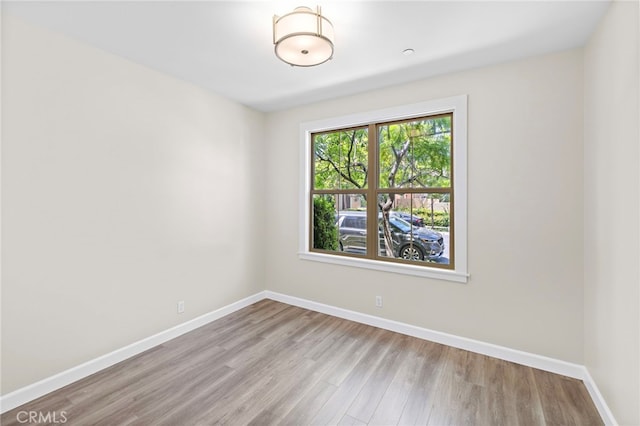 55 Jade Flower, Irvine, CA 92620 - spare room with wood finished floors and baseboards