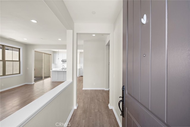 55 Jade Flower, Irvine, CA 92620 - corridor with dark wood finished floors and recessed lighting