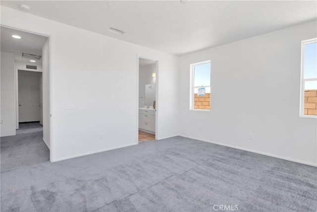 16112 Pablo Ct, Victorville, CA 92395 - unfurnished bedroom featuring carpet floors and ensuite bathroom