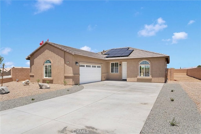 16112 Pablo Ct, Victorville, CA 92395 - single story home with driveway, roof mounted solar panels, stucco siding, and an attached garage