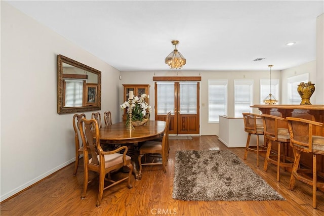 4840 Heleo Ave, Temple City, CA 91780 - dining space with wood finished floors, a bar, and recessed lighting