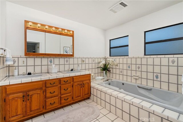 4840 Heleo Ave, Temple City, CA 91780 - full bathroom featuring double vanity, a garden tub, and tile patterned flooring