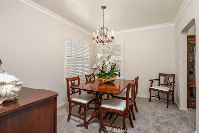 4840 Heleo Ave, Temple City, CA 91780 - dining room with a chandelier, arched walkways, crown molding, and light carpet