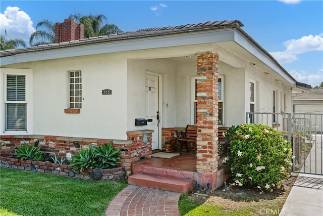 4840 Heleo Ave, Temple City, CA 91780 - view of front of property featuring stucco siding, a chimney, and a gate