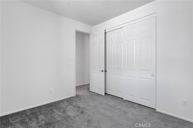 16124 Pablo Ct, Victorville, CA 92395 - unfurnished bedroom with carpet, a textured ceiling, and a closet