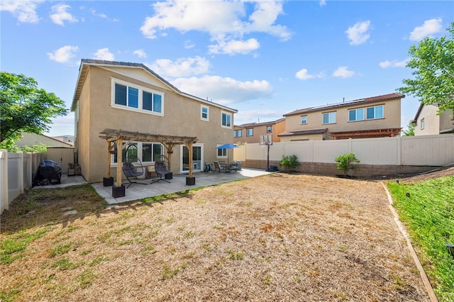 24212 Bay Laurel Ave, Murrieta, CA 92562 - back of house featuring a pergola, a patio, stucco siding, and a fenced backyard
