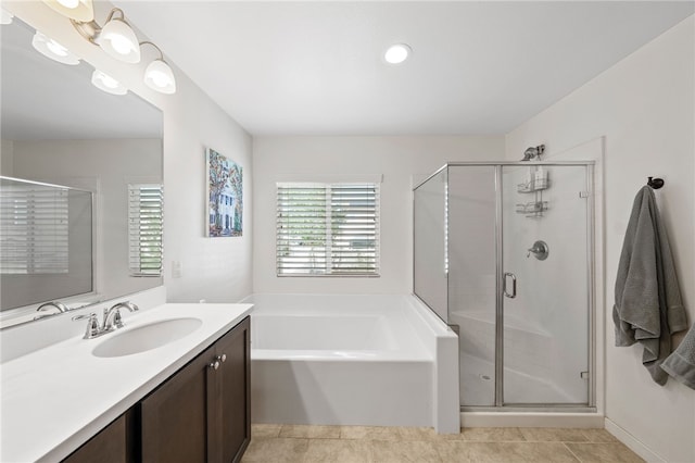 24212 Bay Laurel Ave, Murrieta, CA 92562 - full bathroom with vanity, a bath, a stall shower, tile patterned flooring, and recessed lighting