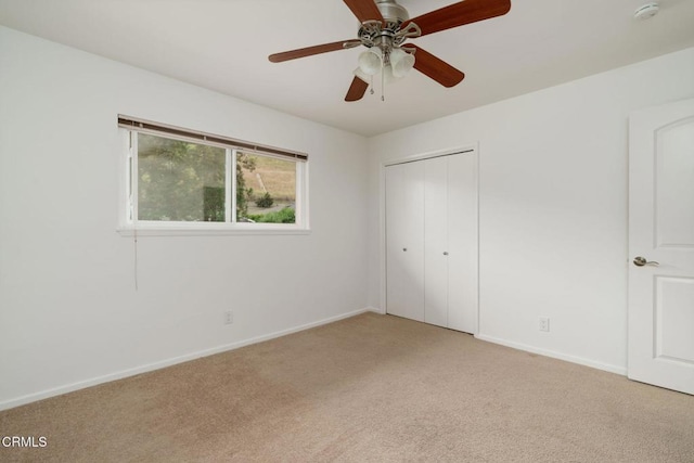 872 Via Arroyo, Ventura, CA 93003 - unfurnished bedroom with light colored carpet, a closet, and a ceiling fan