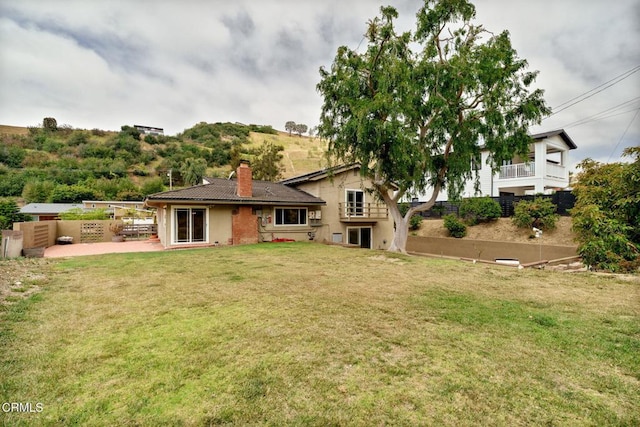 872 Via Arroyo, Ventura, CA 93003 - rear view of property featuring a chimney and a patio