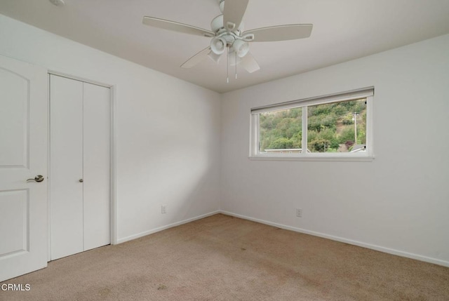 872 Via Arroyo, Ventura, CA 93003 - unfurnished bedroom with light carpet, a closet, and ceiling fan