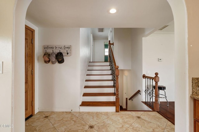 872 Via Arroyo, Ventura, CA 93003 - stairway featuring tile patterned floors, arched walkways, and recessed lighting