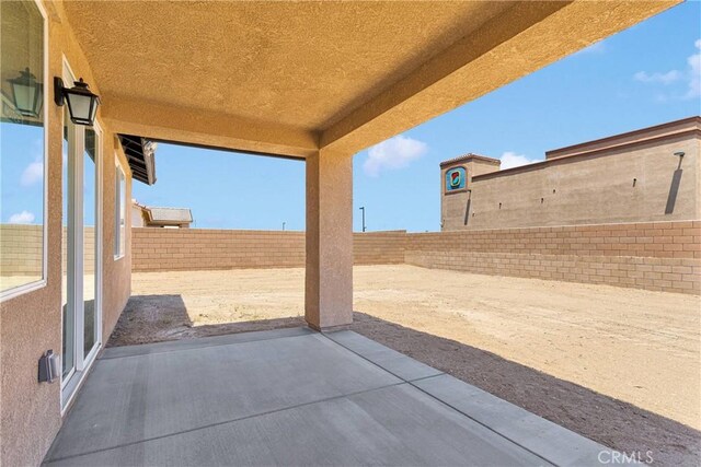 16148 Pablo Ct, Victorville, CA 92395 - fenced backyard featuring a patio area