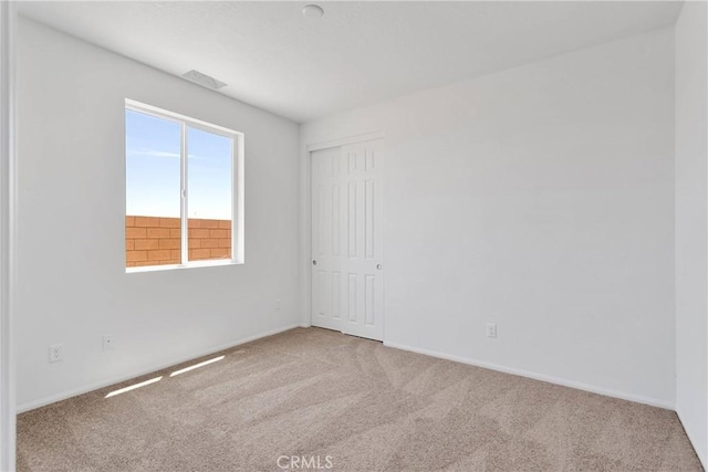 16148 Pablo Ct, Victorville, CA 92395 - carpeted spare room featuring baseboards