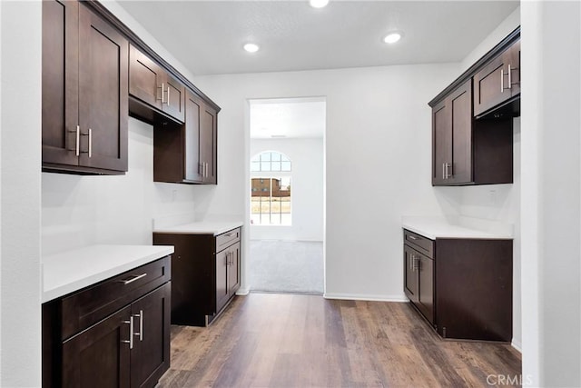 16148 Pablo Ct, Victorville, CA 92395 - kitchen with dark brown cabinets, dark wood-style floors, light countertops, and recessed lighting