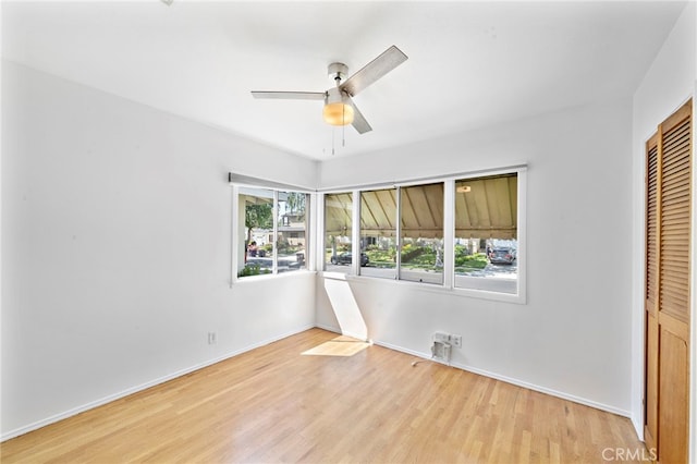 2460 Vuelta Grande Ave, Long Beach, CA 90815 - unfurnished bedroom with a closet, light wood-style floors, and ceiling fan