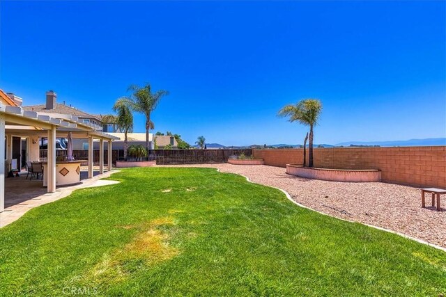 32669 Armoise Dr, Winchester, CA 92596 - fenced backyard with a patio