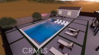 32669 Armoise Dr, Winchester, CA 92596 - view of swimming pool with a hot tub