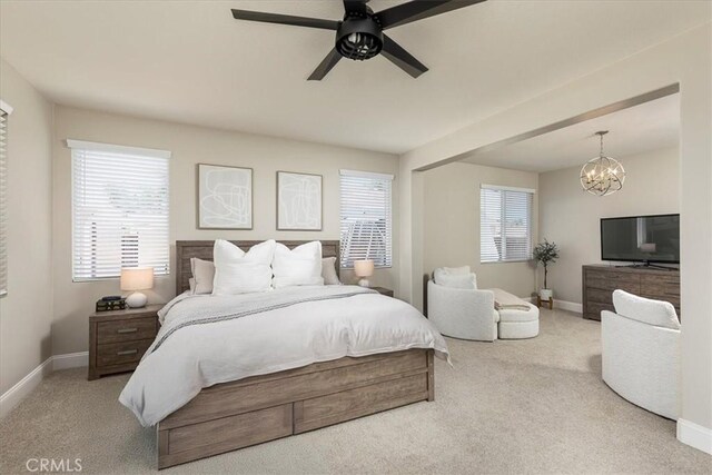 32669 Armoise Dr, Winchester, CA 92596 - bedroom featuring carpet, a chandelier, and a ceiling fan