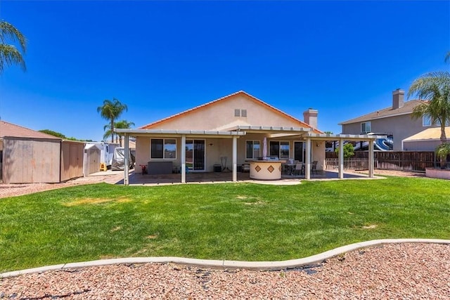 32669 Armoise Dr, Winchester, CA 92596 - back of property featuring a shed, a patio area, and stucco siding