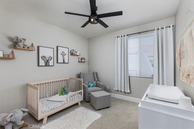32669 Armoise Dr, Winchester, CA 92596 - bedroom with a crib, carpet, and a ceiling fan