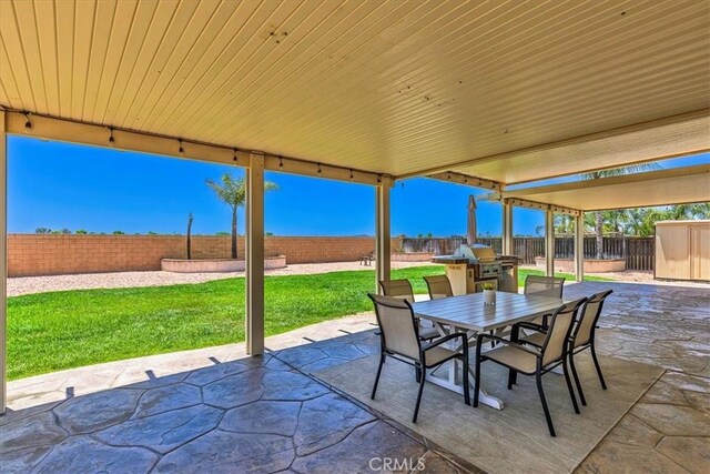 32669 Armoise Dr, Winchester, CA 92596 - fenced backyard with outdoor dining space, a patio, and a shed
