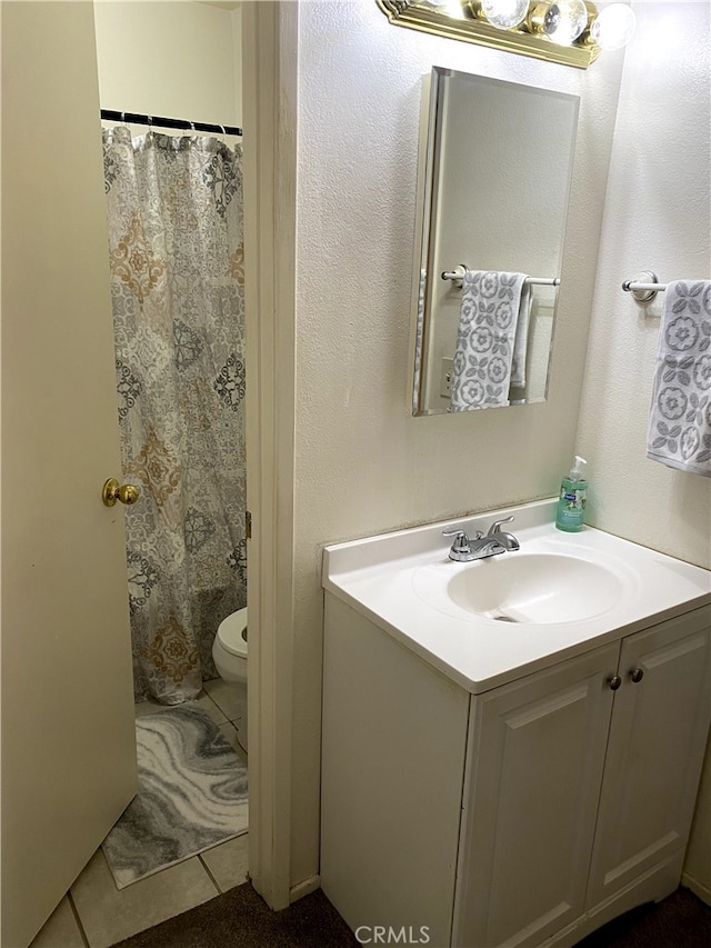9649 Spyglass Ave Unit 94, Desert Hot Springs, CA 92240 - full bathroom with vanity, tile patterned flooring, and curtained shower