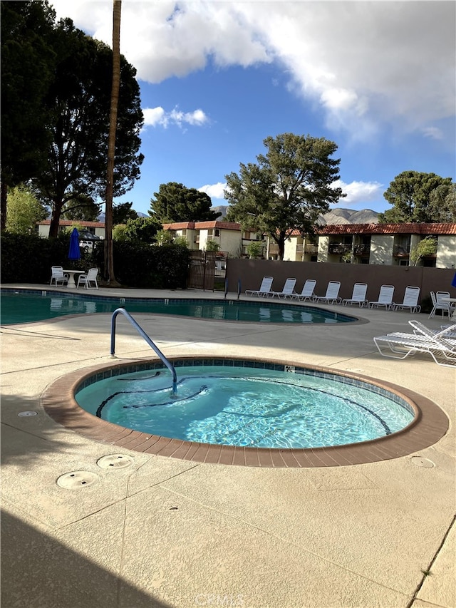 9649 Spyglass Ave Unit 94, Desert Hot Springs, CA 92240 - community pool featuring a patio area
