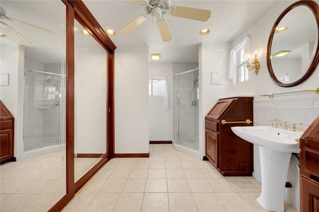 4159 Redline Dr, Lakewood, CA 90713 - full bathroom featuring a ceiling fan, a stall shower, tile patterned floors, and recessed lighting