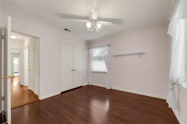 4159 Redline Dr, Lakewood, CA 90713 - unfurnished bedroom with wood finished floors, crown molding, a ceiling fan, and a closet