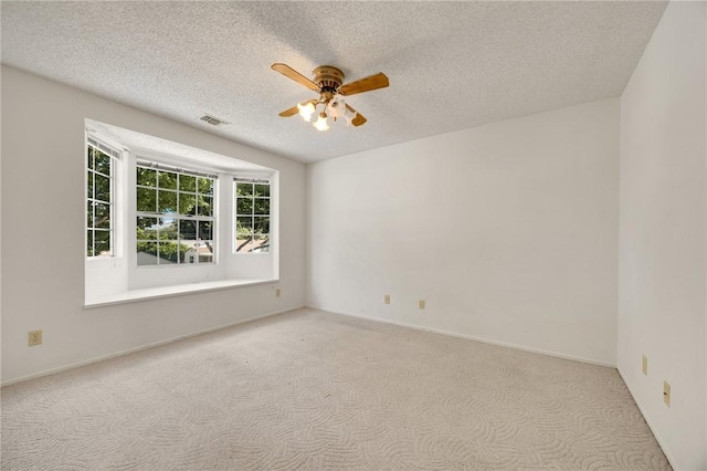 4159 Redline Dr, Lakewood, CA 90713 - spare room featuring a ceiling fan, carpet floors, and a textured ceiling