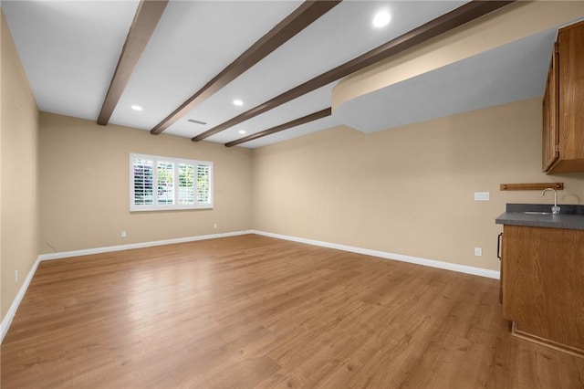 4159 Redline Dr, Lakewood, CA 90713 - unfurnished living room with beamed ceiling, light wood-type flooring, and recessed lighting