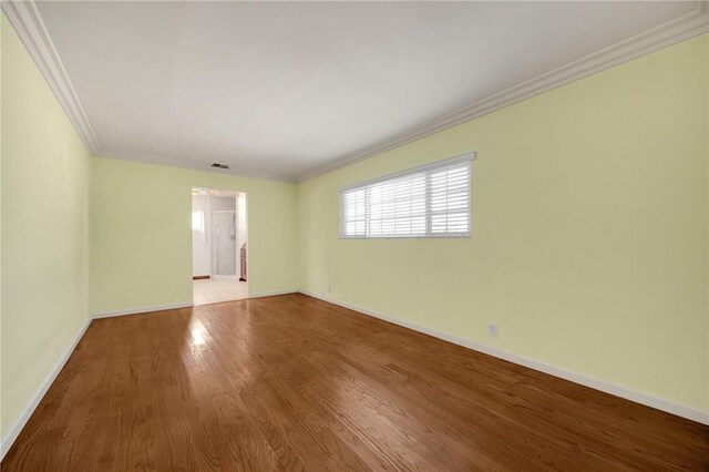 4159 Redline Dr, Lakewood, CA 90713 - empty room with crown molding and wood finished floors