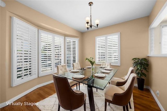 4159 Redline Dr, Lakewood, CA 90713 - dining room with wood finished floors and a chandelier
