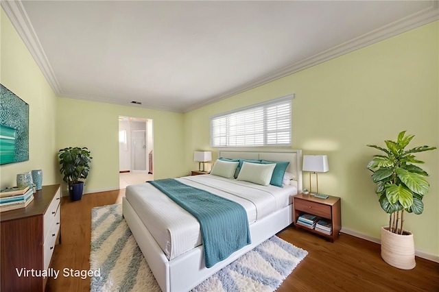 4159 Redline Dr, Lakewood, CA 90713 - bedroom with crown molding, wood finished floors, and connected bathroom
