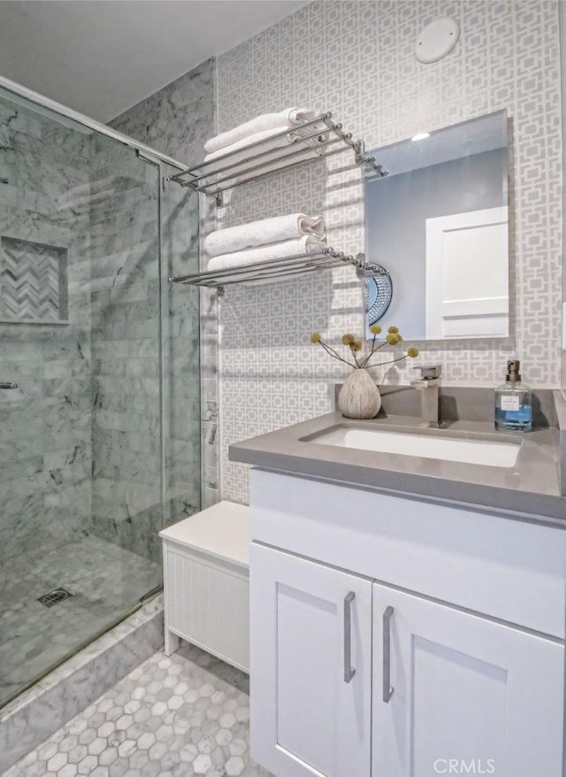 5435 W 76th St, Los Angeles, CA 90045 - full bath with a shower stall, vanity, and tile patterned floors