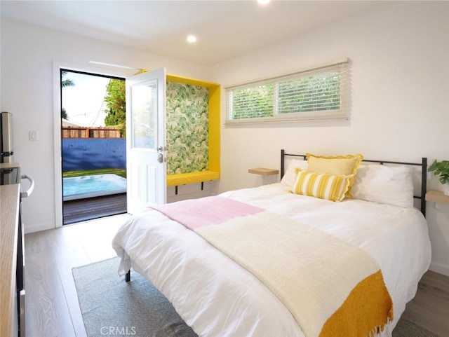 5435 W 76th St, Los Angeles, CA 90045 - bedroom with access to outside, wood finished floors, multiple windows, and recessed lighting