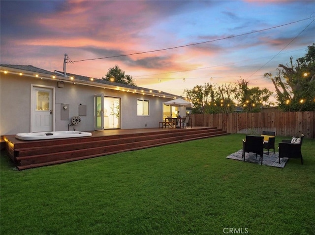 5435 W 76th St, Los Angeles, CA 90045 - yard at dusk featuring a wooden deck and a hot tub