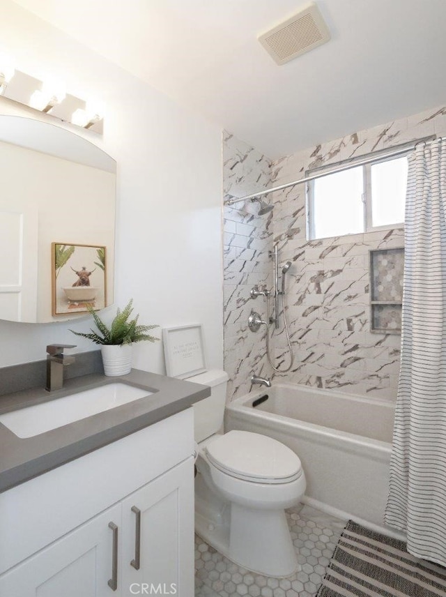 5435 W 76th St, Los Angeles, CA 90045 - bathroom with shower / bath combination with curtain, vanity, and tile patterned floors