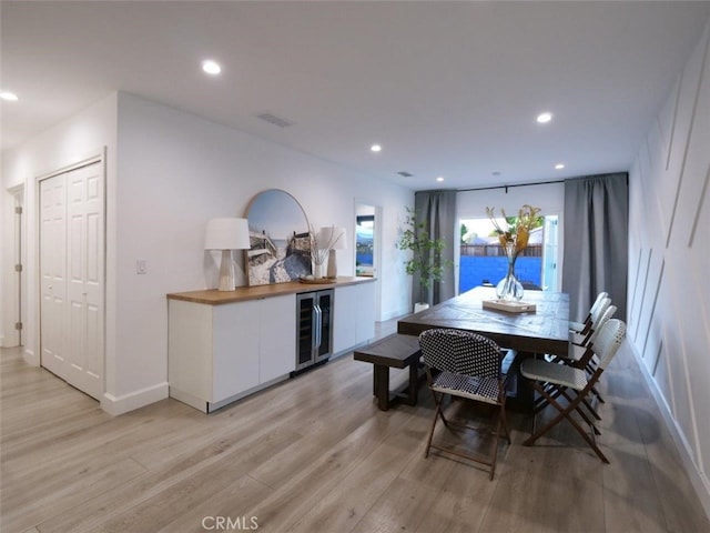 5435 W 76th St, Los Angeles, CA 90045 - dining space with beverage cooler, light wood-style flooring, and recessed lighting
