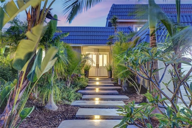 891 Palo Verde Ave, Long Beach, CA 90815 - doorway to property featuring a tile roof