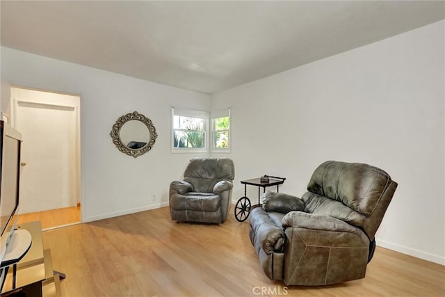 891 Palo Verde Ave, Long Beach, CA 90815 - living area featuring wood finished floors and baseboards