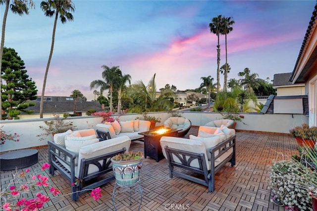 891 Palo Verde Ave, Long Beach, CA 90815 - patio terrace at dusk with an outdoor living space with a fire pit and a patio