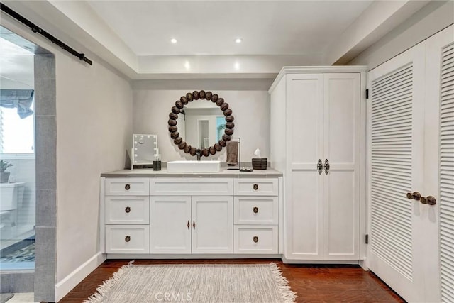 891 Palo Verde Ave, Long Beach, CA 90815 - bathroom featuring wood finished floors, vanity, a tile shower, recessed lighting, and a closet
