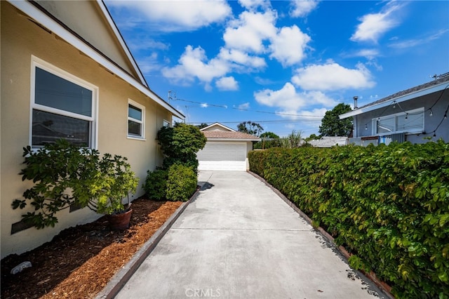 209 S Homerest Ave, West Covina, CA 91791 - view of yard with a detached garage and an outbuilding