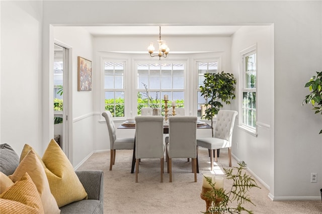 209 S Homerest Ave, West Covina, CA 91791 - dining area featuring light colored carpet and a chandelier