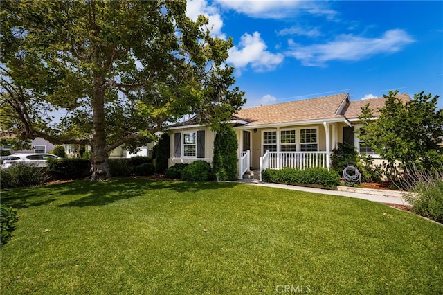209 S Homerest Ave, West Covina, CA 91791 - view of front facade with a front yard, a porch, and stucco siding