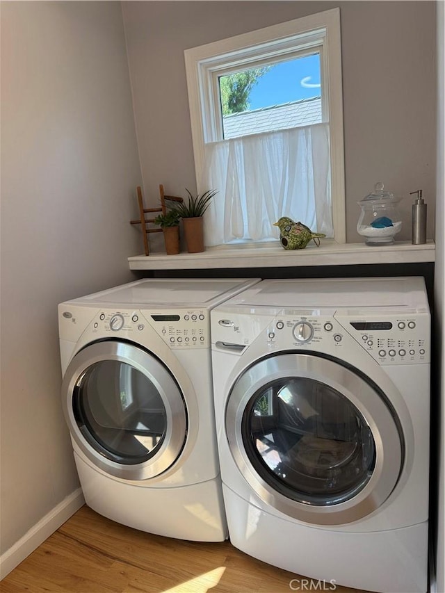 315 W 6th Ave, Chico, CA 95926 - laundry room featuring washer and dryer and light wood finished floors