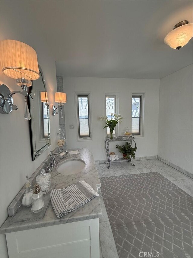 315 W 6th Ave, Chico, CA 95926 - bathroom with vanity and baseboards